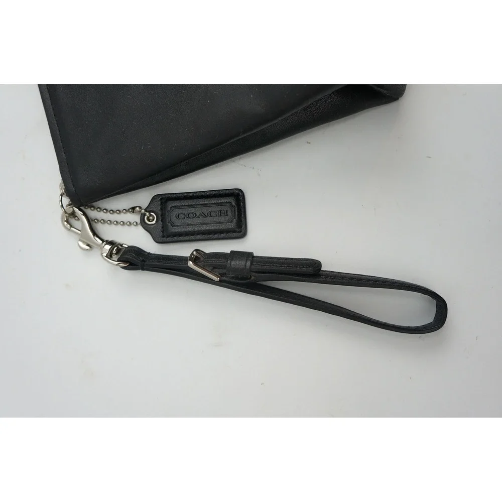Coach Wristlet Black Leather Silver Hardware Logo Plaque Excellent